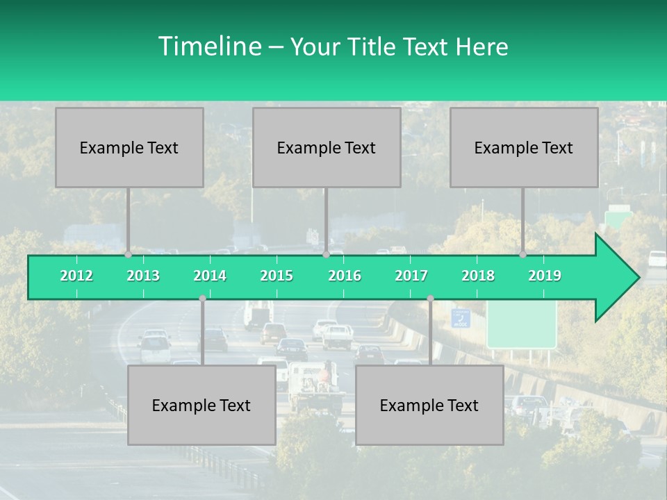 A Highway Filled With Lots Of Traffic Next To Trees PowerPoint Template