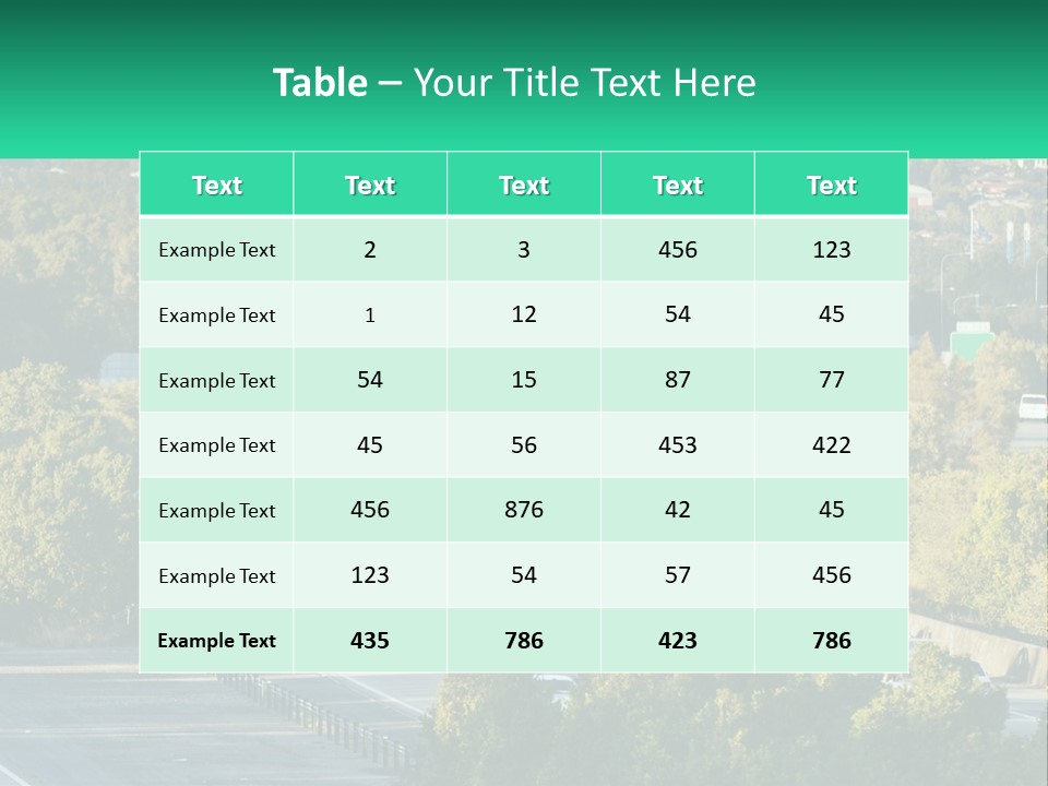 A Highway Filled With Lots Of Traffic Next To Trees PowerPoint Template