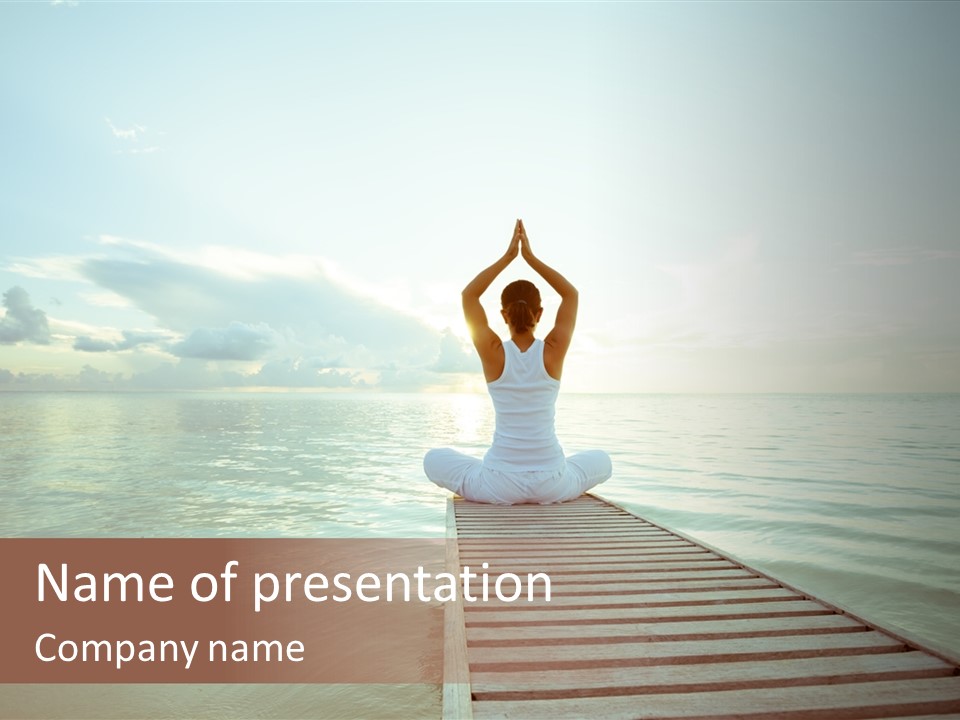 A Woman Sitting On A Dock Doing Yoga PowerPoint Template
