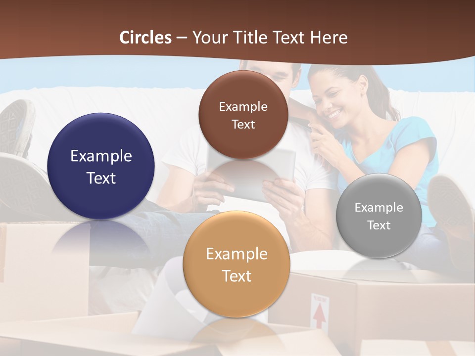 A Man And Woman Sitting On A Couch Surrounded By Boxes PowerPoint Template