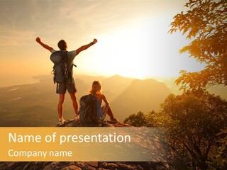 A Man And A Woman Sitting On Top Of A Mountain PowerPoint Template