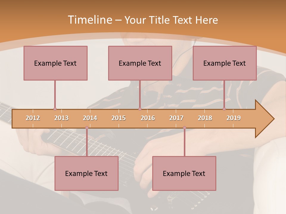 A Man Sitting On A Couch Playing A Guitar PowerPoint Template