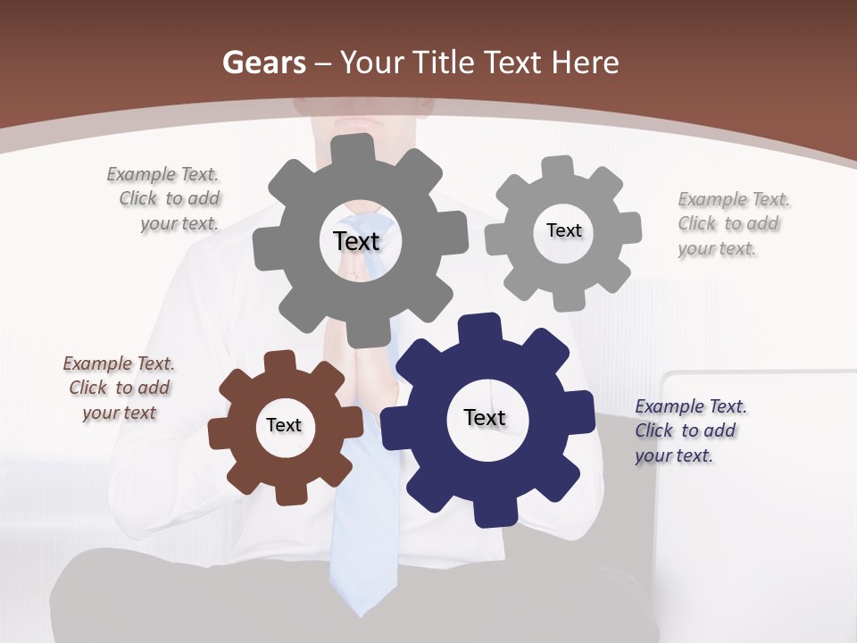 A Man Sitting On A Desk With His Hands Folded In Front Of Him PowerPoint Template
