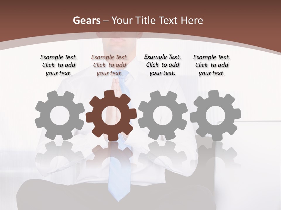 A Man Sitting On A Desk With His Hands Folded In Front Of Him PowerPoint Template