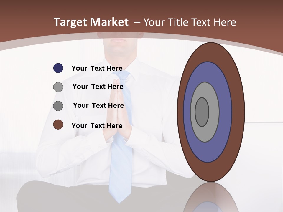 A Man Sitting On A Desk With His Hands Folded In Front Of Him PowerPoint Template