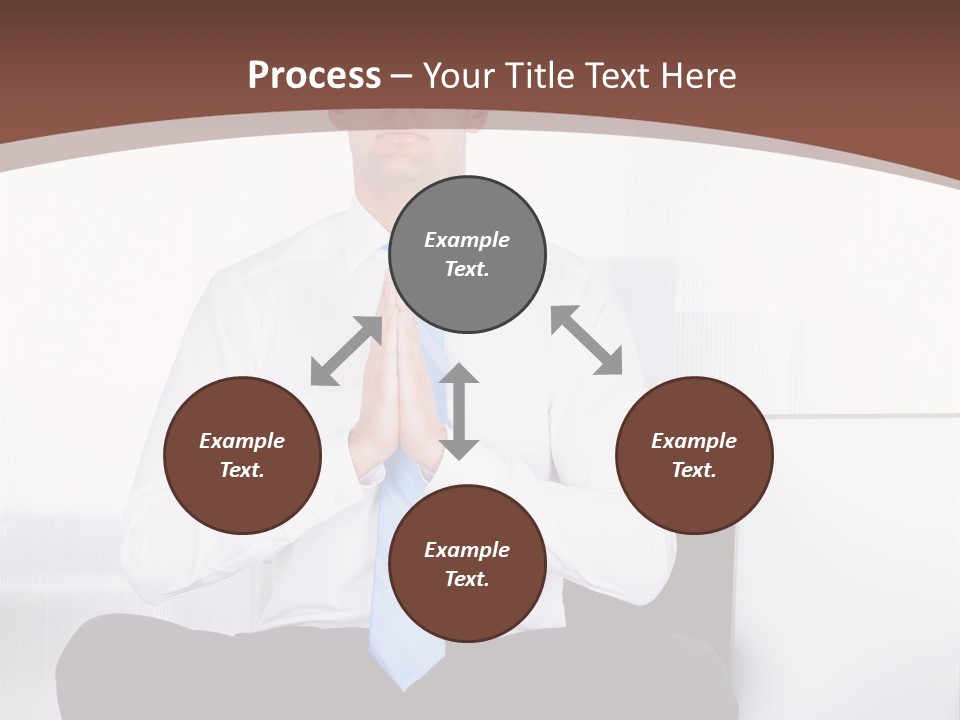 A Man Sitting On A Desk With His Hands Folded In Front Of Him PowerPoint Template