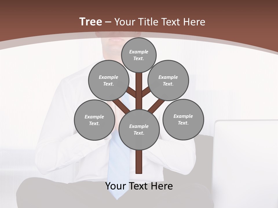 A Man Sitting On A Desk With His Hands Folded In Front Of Him PowerPoint Template