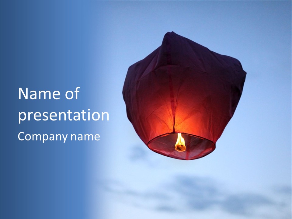 A Red Paper Lantern Floating In The Air PowerPoint Template