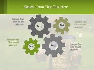 A Little Girl Blowing A Dandelion In A Field PowerPoint Template