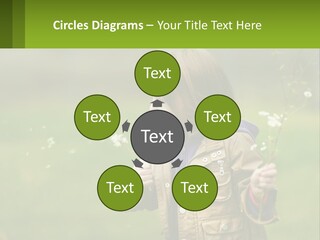 A Little Girl Blowing A Dandelion In A Field PowerPoint Template