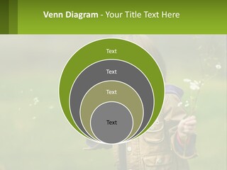 A Little Girl Blowing A Dandelion In A Field PowerPoint Template