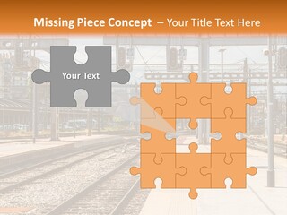 A Train Station With A Train On The Tracks PowerPoint Template