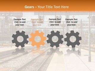 A Train Station With A Train On The Tracks PowerPoint Template
