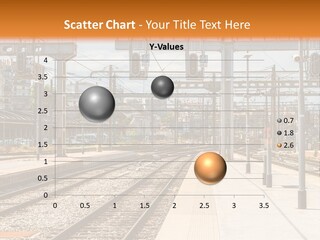 A Train Station With A Train On The Tracks PowerPoint Template