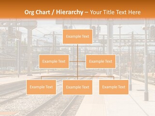 A Train Station With A Train On The Tracks PowerPoint Template