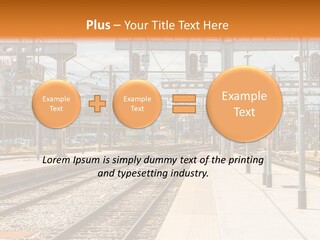 A Train Station With A Train On The Tracks PowerPoint Template