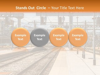 A Train Station With A Train On The Tracks PowerPoint Template