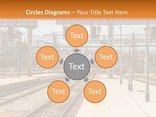 A Train Station With A Train On The Tracks PowerPoint Template