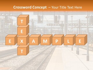 A Train Station With A Train On The Tracks PowerPoint Template