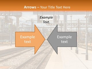 A Train Station With A Train On The Tracks PowerPoint Template