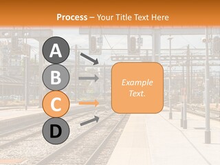 A Train Station With A Train On The Tracks PowerPoint Template