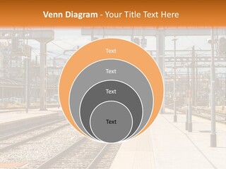 A Train Station With A Train On The Tracks PowerPoint Template