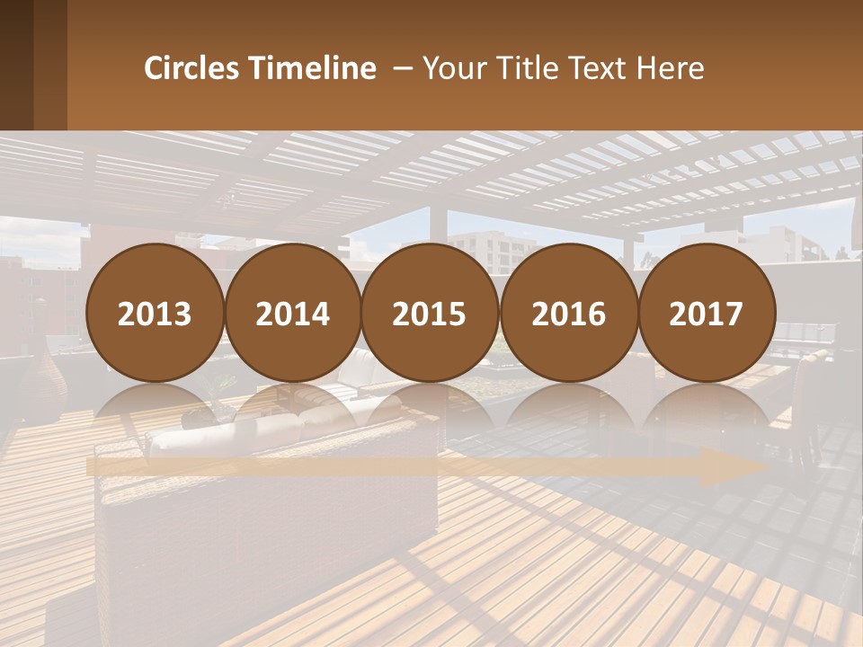 A Wooden Deck With A Table And Chairs PowerPoint Template