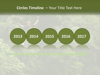 A Man Is Zipping Through The Air On A Rope PowerPoint Template