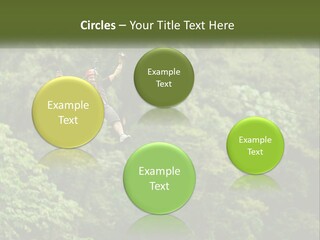 A Man Is Zipping Through The Air On A Rope PowerPoint Template