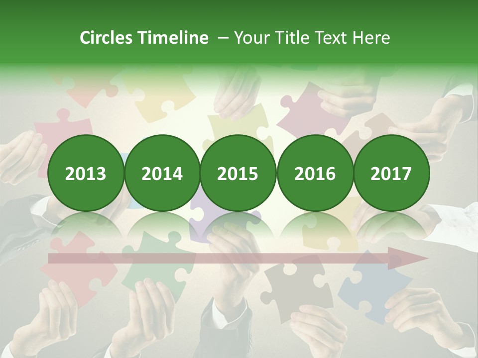 A Group Of People Holding Puzzle Pieces Together PowerPoint Template