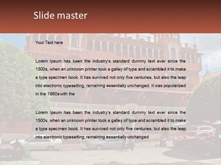 A Large Building With Cars Parked In Front Of It PowerPoint Template