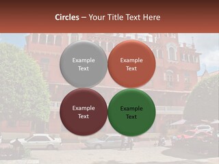 A Large Building With Cars Parked In Front Of It PowerPoint Template