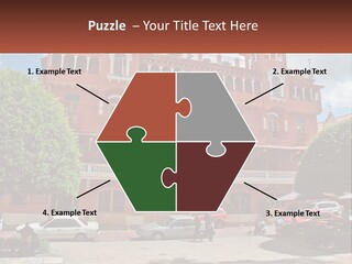 A Large Building With Cars Parked In Front Of It PowerPoint Template