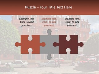 A Large Building With Cars Parked In Front Of It PowerPoint Template