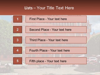 A Large Building With Cars Parked In Front Of It PowerPoint Template