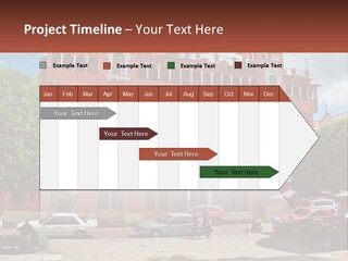 A Large Building With Cars Parked In Front Of It PowerPoint Template