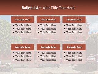 A Large Building With Cars Parked In Front Of It PowerPoint Template