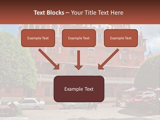 A Large Building With Cars Parked In Front Of It PowerPoint Template