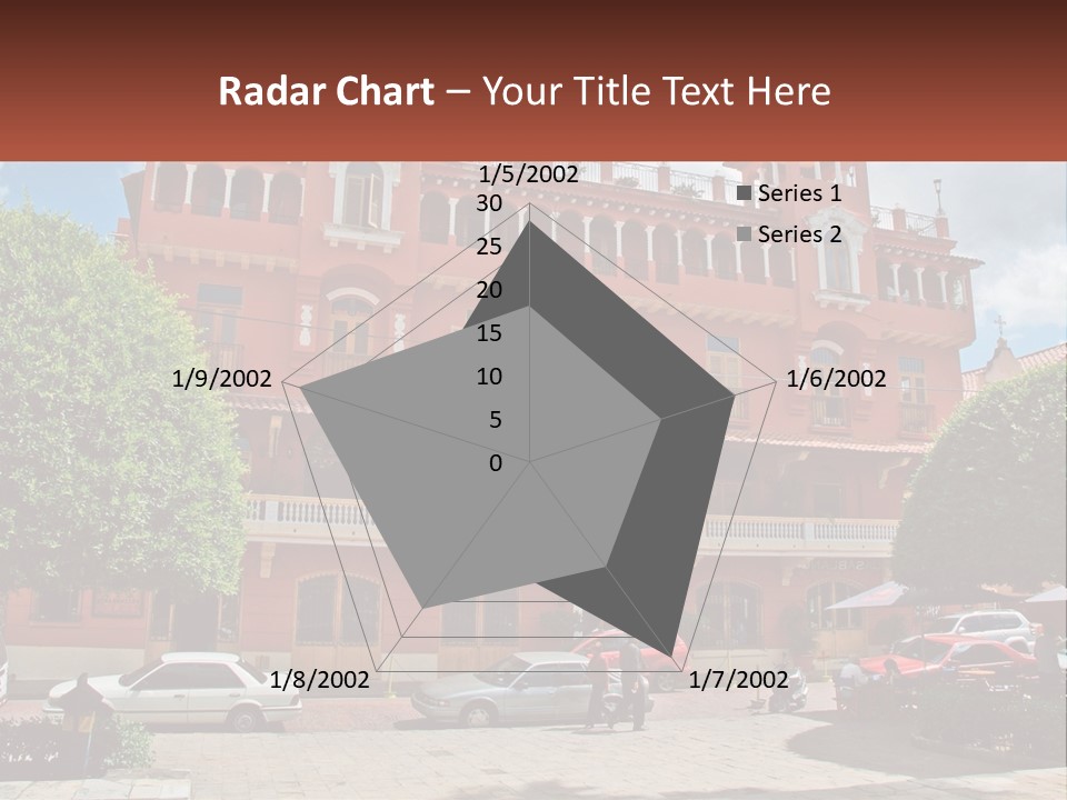 A Large Building With Cars Parked In Front Of It PowerPoint Template