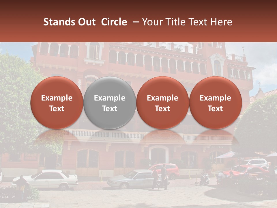 A Large Building With Cars Parked In Front Of It PowerPoint Template