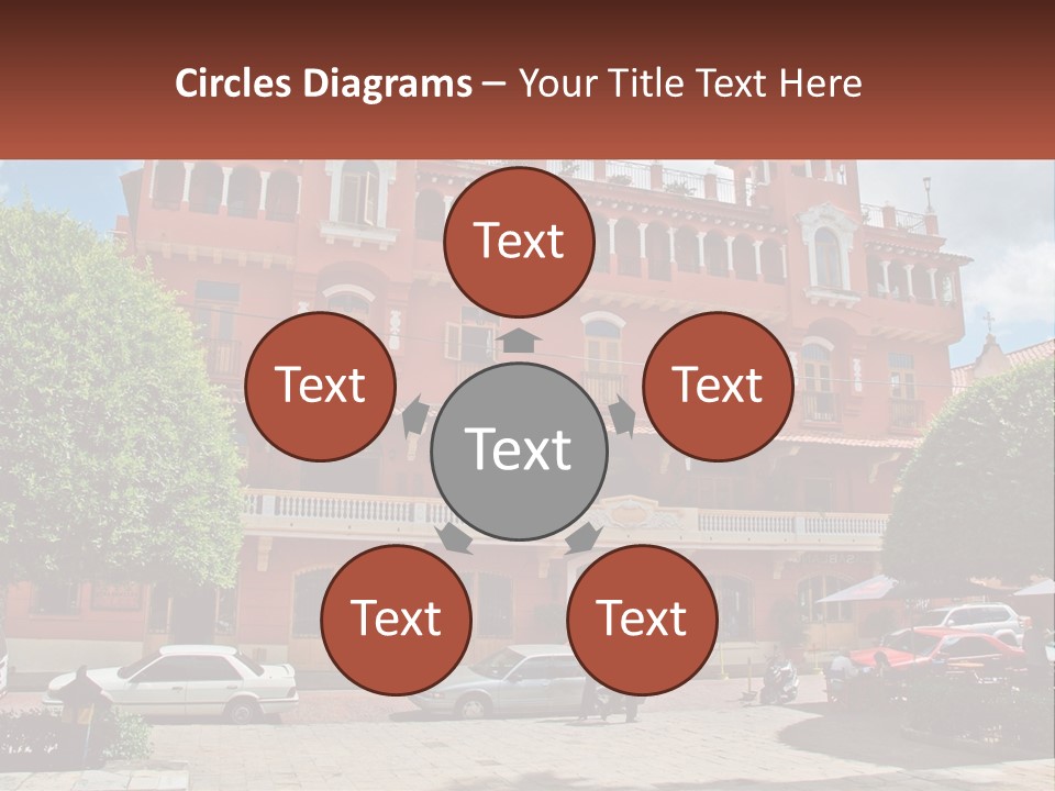 A Large Building With Cars Parked In Front Of It PowerPoint Template