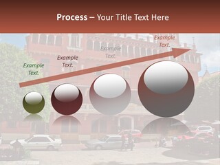 A Large Building With Cars Parked In Front Of It PowerPoint Template