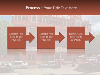 A Large Building With Cars Parked In Front Of It PowerPoint Template