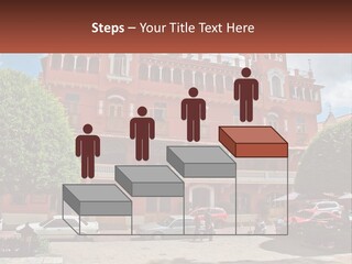 A Large Building With Cars Parked In Front Of It PowerPoint Template