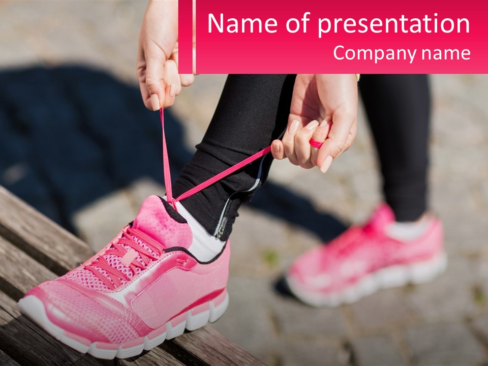 A Person Tying A Shoelace On A Bench PowerPoint Template