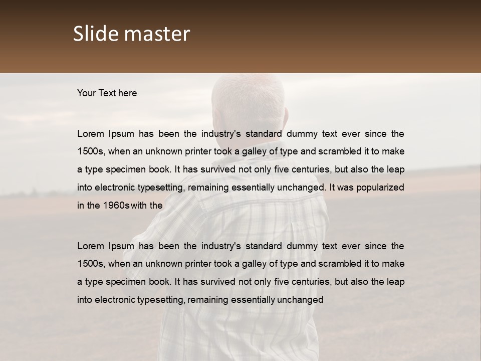 A Man Standing In A Field Looking At The Sky PowerPoint Template