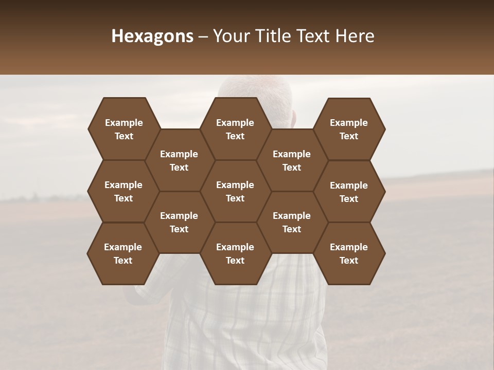 A Man Standing In A Field Looking At The Sky PowerPoint Template