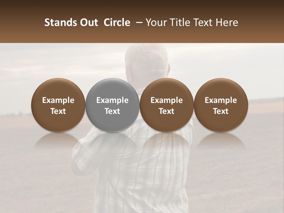 A Man Standing In A Field Looking At The Sky PowerPoint Template