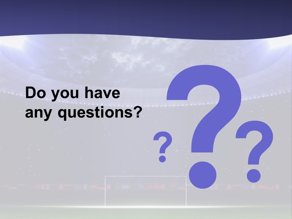 A Soccer Ball On A Soccer Field With A Stadium In The Background PowerPoint Template