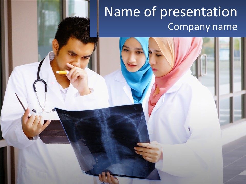 A Man And Woman Looking At A X - Ray PowerPoint Template